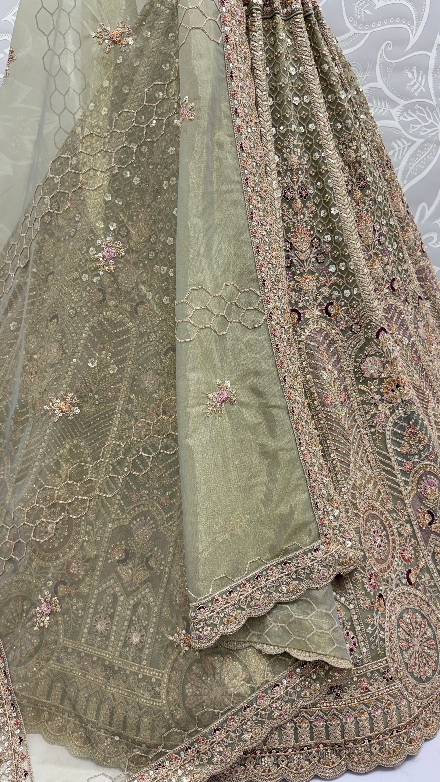 Sage Green Bridal Net Lehenga Choli with Fancy Chapat Zari, Multi Thread Embroidery & Zircon Diamond Work