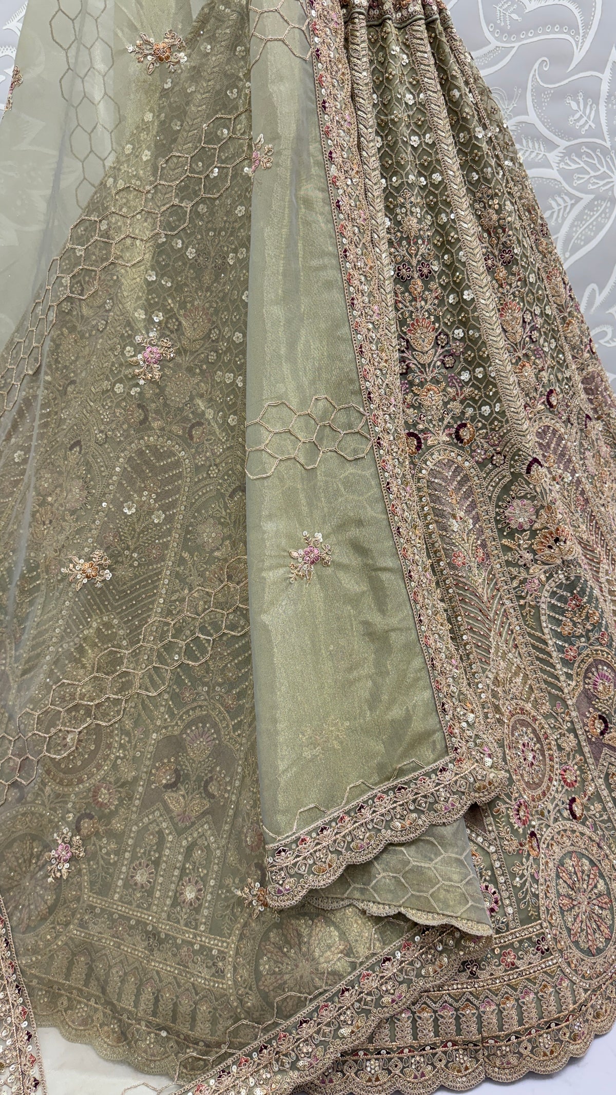 Sage Green Bridal Net Lehenga Choli with Fancy Chapat Zari, Multi Thread Embroidery & Zircon Diamond Work