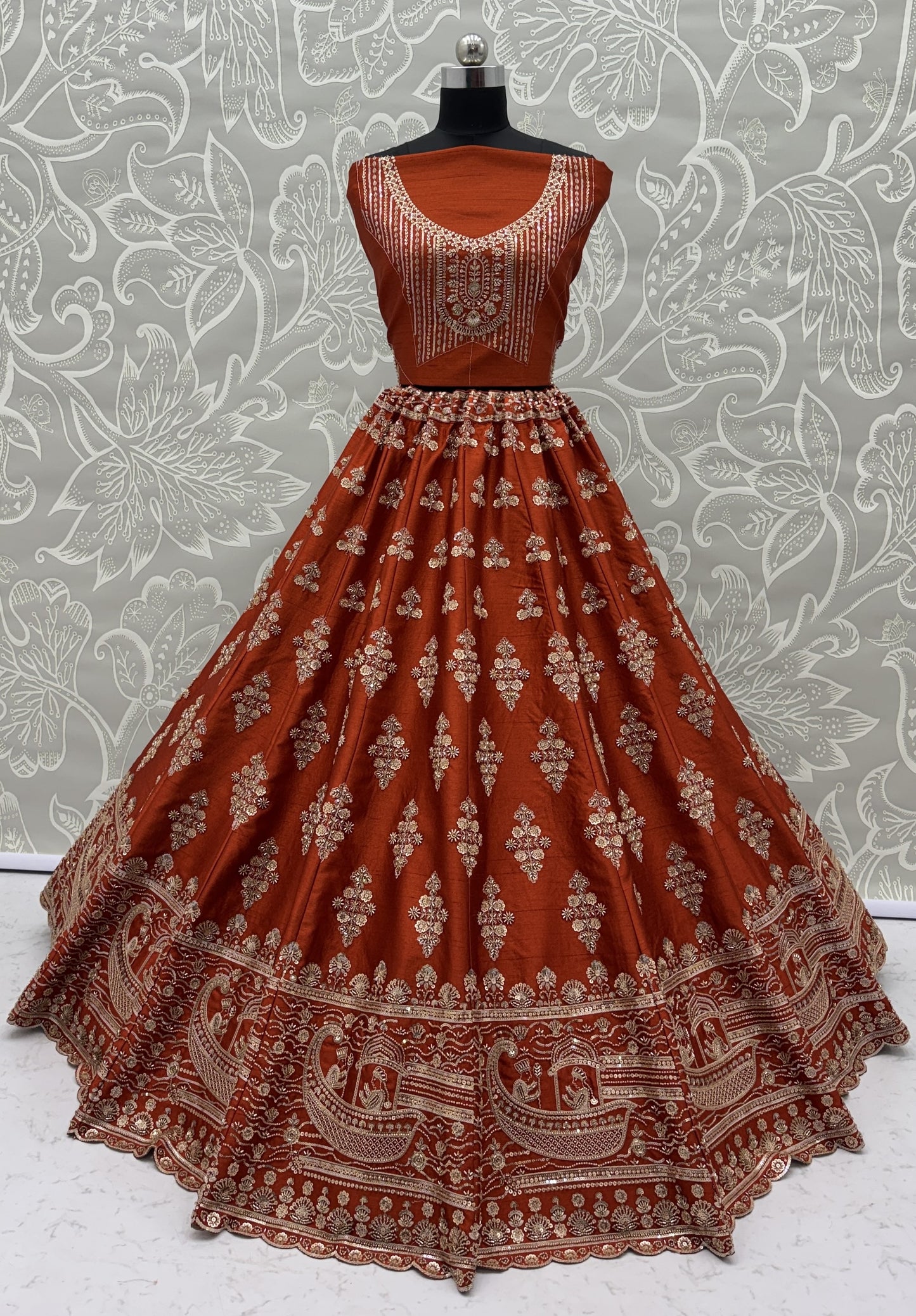 Rust Orange Slub Silk Bridal Lehenga Choli with Handcrafted Motif Work, Crystal Pipe Work & Net Dupatta