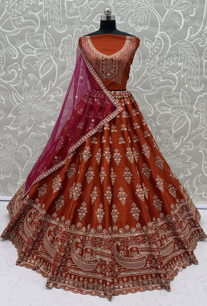 Rust Orange Slub Silk Bridal Lehenga Choli with Handcrafted Motif Work, Crystal Pipe Work & Net Dupatta