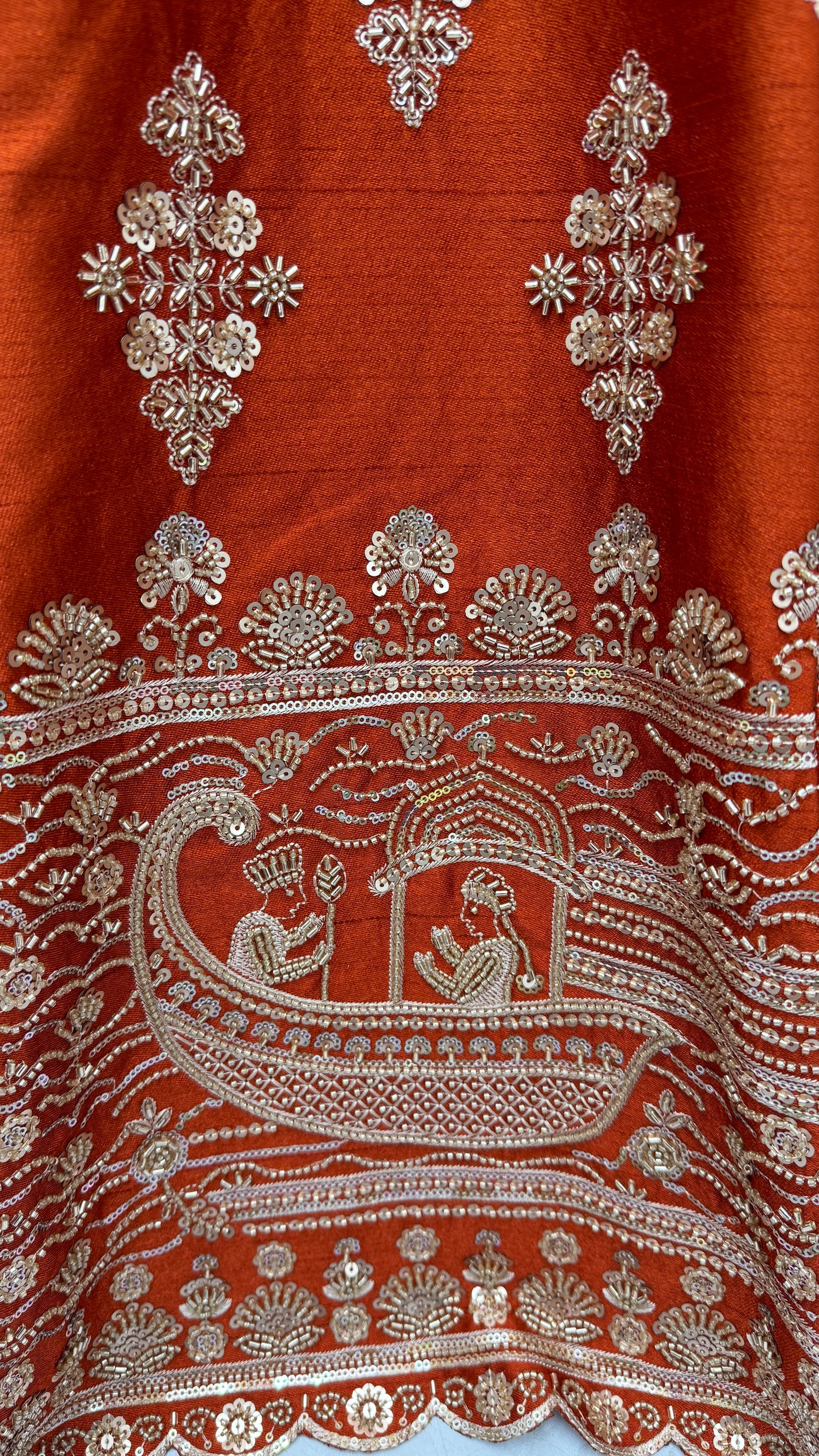 Rust Orange Slub Silk Bridal Lehenga Choli with Handcrafted Motif Work, Crystal Pipe Work & Net Dupatta