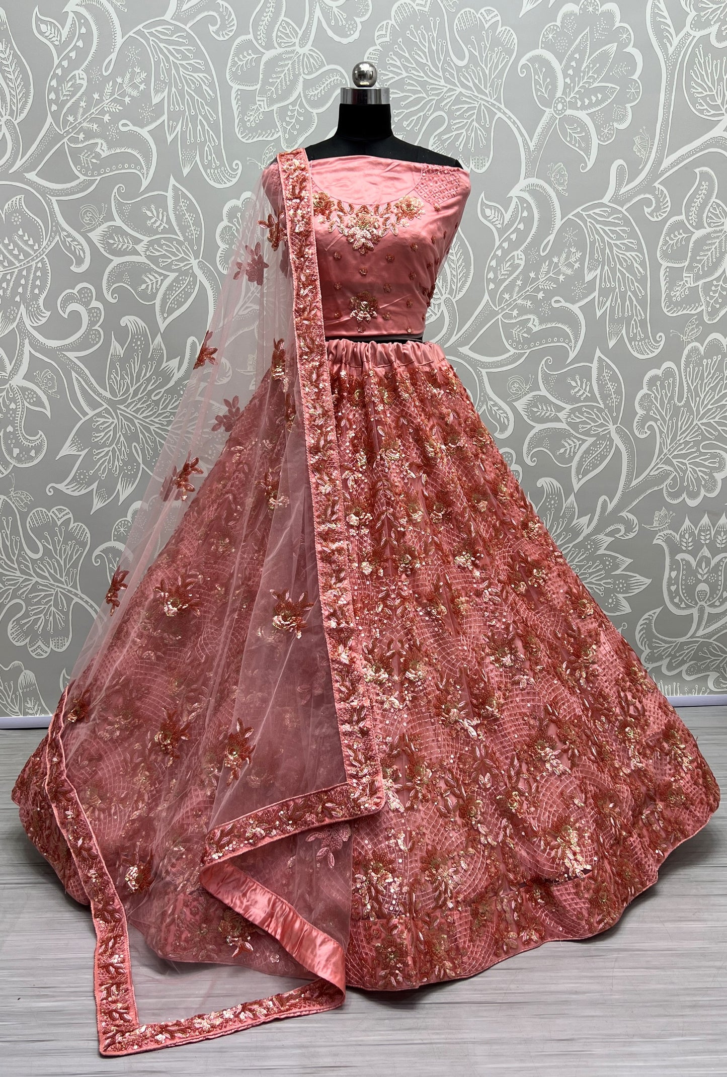 Blush Pink Heavy Net Bridal Lehenga Choli with Floral Sequins, Thread & Zari Embroidery