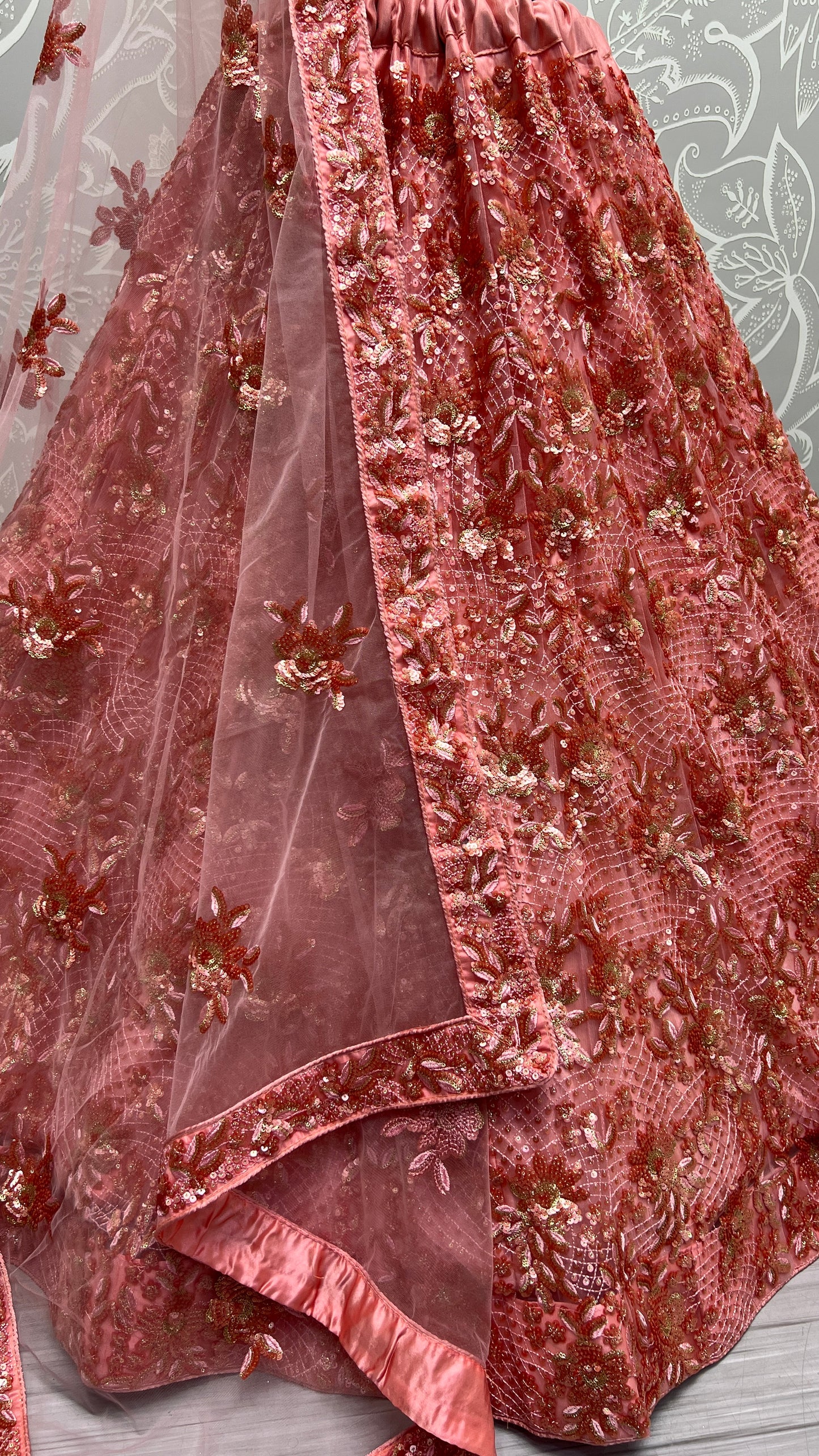 Blush Pink Heavy Net Bridal Lehenga Choli with Floral Sequins, Thread & Zari Embroidery