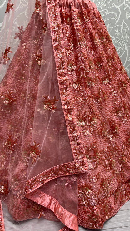 Blush Pink Heavy Net Bridal Lehenga Choli with Floral Sequins, Thread & Zari Embroidery