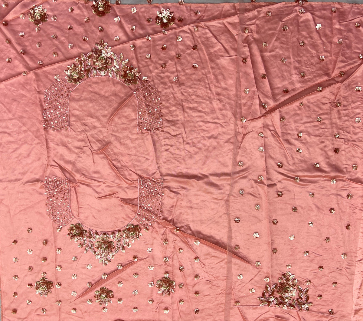 Blush Pink Heavy Net Bridal Lehenga Choli with Floral Sequins, Thread & Zari Embroidery