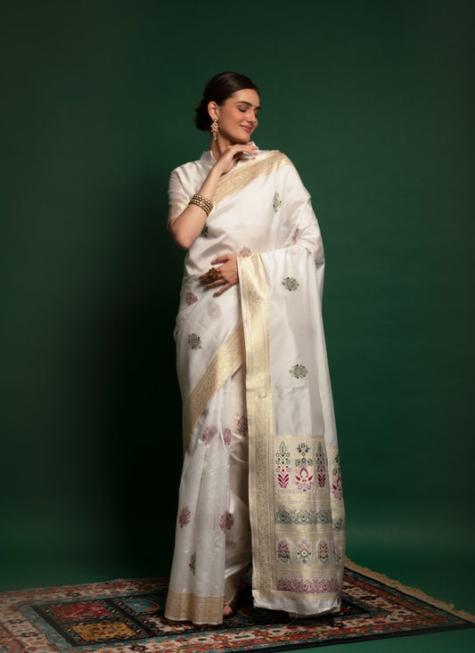 Silk Crafted with selected Zari and dhaga matching extra ordinary Silk Saree White