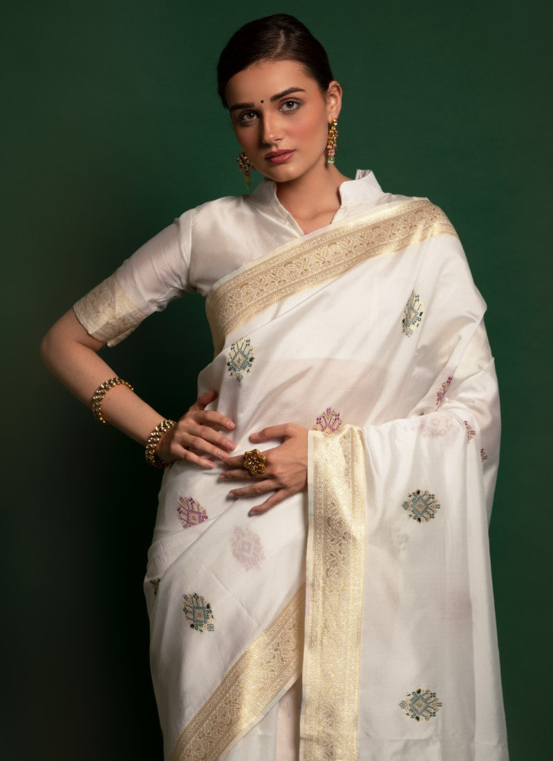 Silk Crafted with selected Zari and dhaga matching extra ordinary Silk Saree White