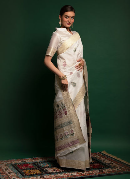 Silk Crafted with selected Zari and dhaga matching extra ordinary Silk Saree White