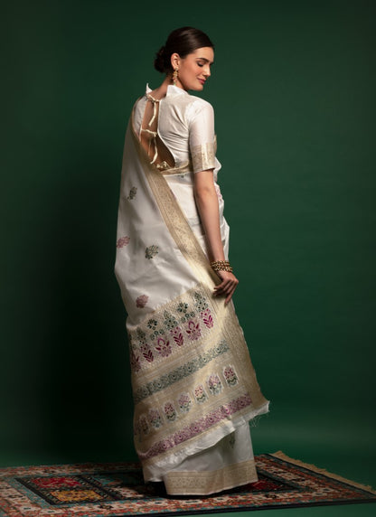 Silk Crafted with selected Zari and dhaga matching extra ordinary Silk Saree White