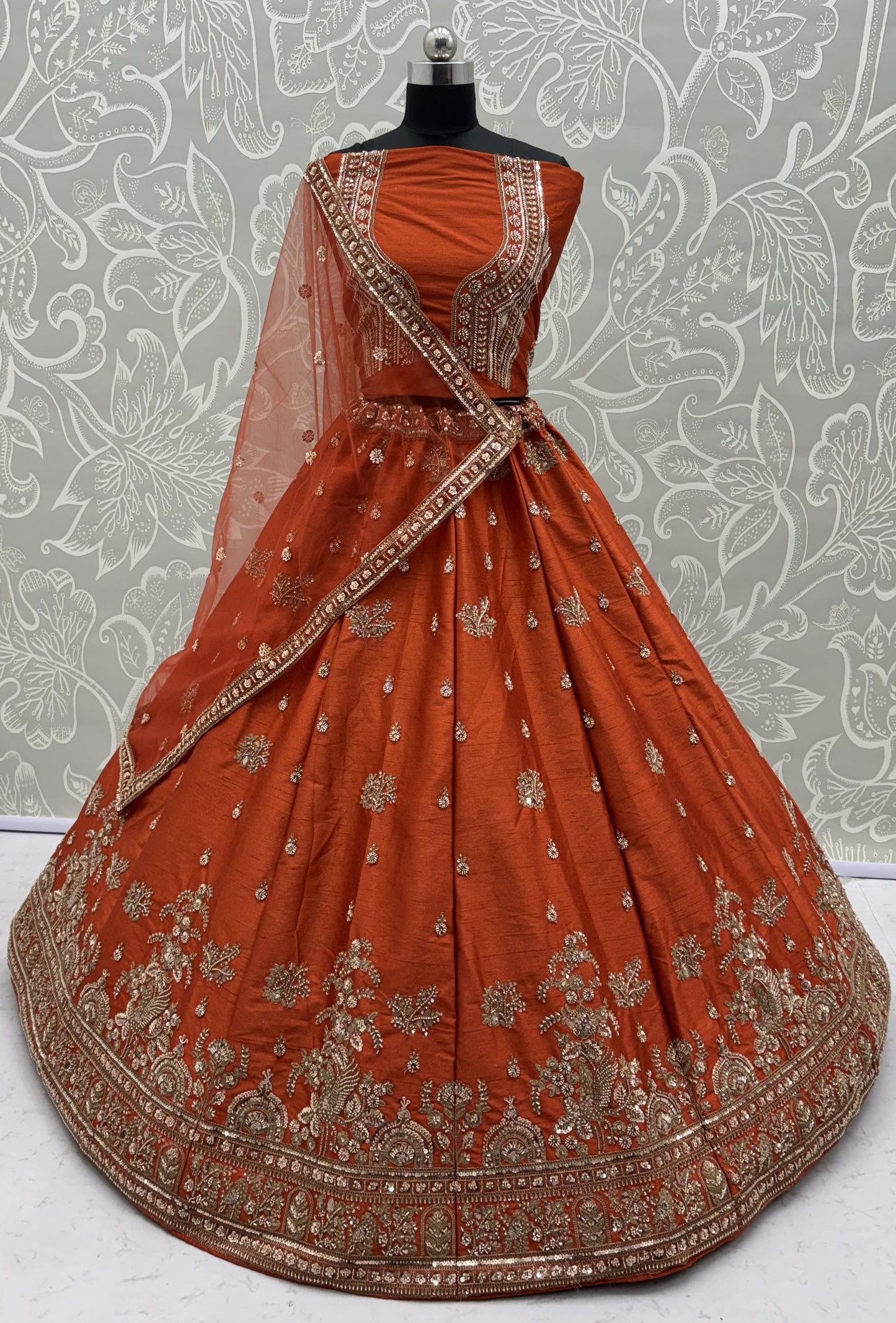 Rust Orange Gadhwal Silk Bridal Lehenga Choli with Zari Embroidery, Bead Work & Designer Net Dupatta