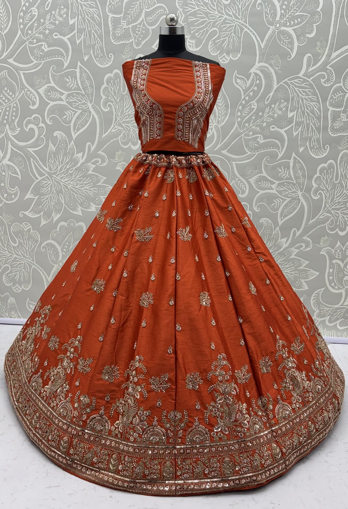 Rust Orange Gadhwal Silk Bridal Lehenga Choli with Zari Embroidery, Bead Work & Designer Net Dupatta