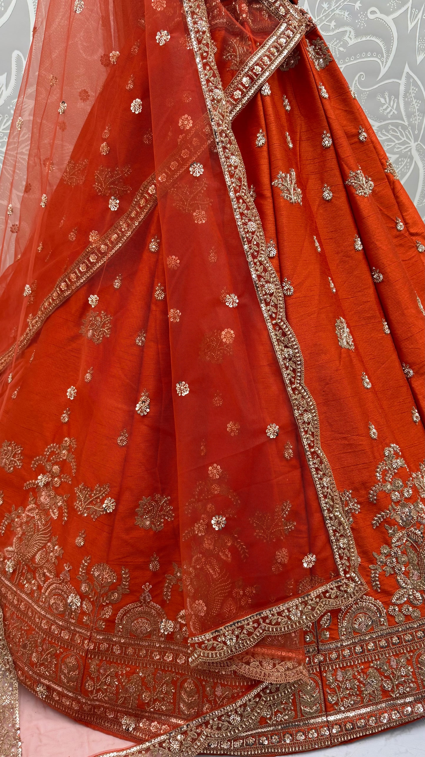 Rust Orange Gadhwal Silk Bridal Lehenga Choli with Zari Embroidery, Bead Work & Designer Net Dupatta