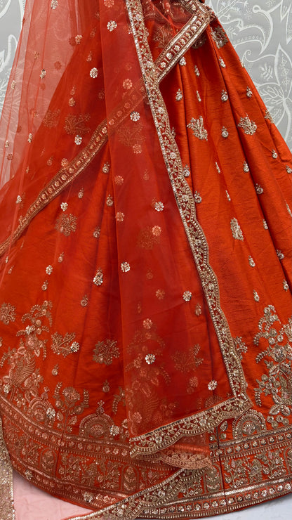Rust Orange Gadhwal Silk Bridal Lehenga Choli with Zari Embroidery, Bead Work & Designer Net Dupatta