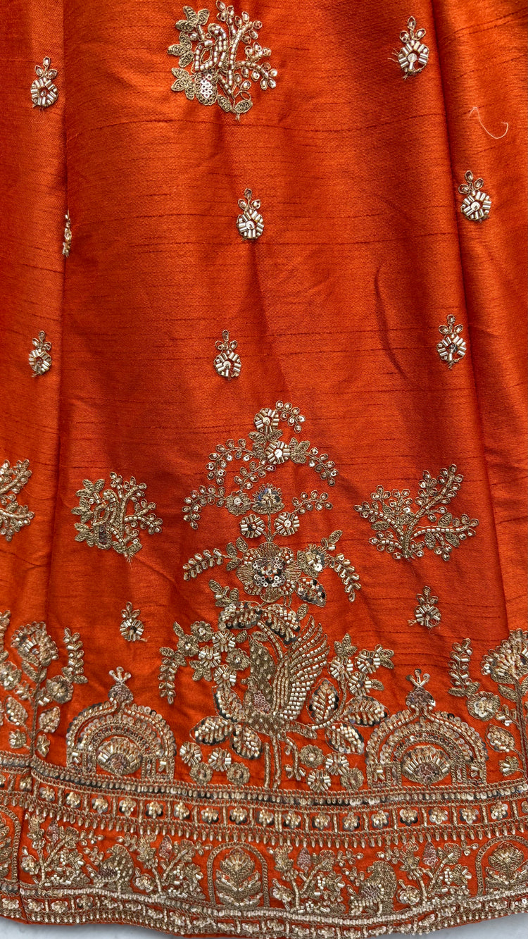 Rust Orange Gadhwal Silk Bridal Lehenga Choli with Zari Embroidery, Bead Work & Designer Net Dupatta