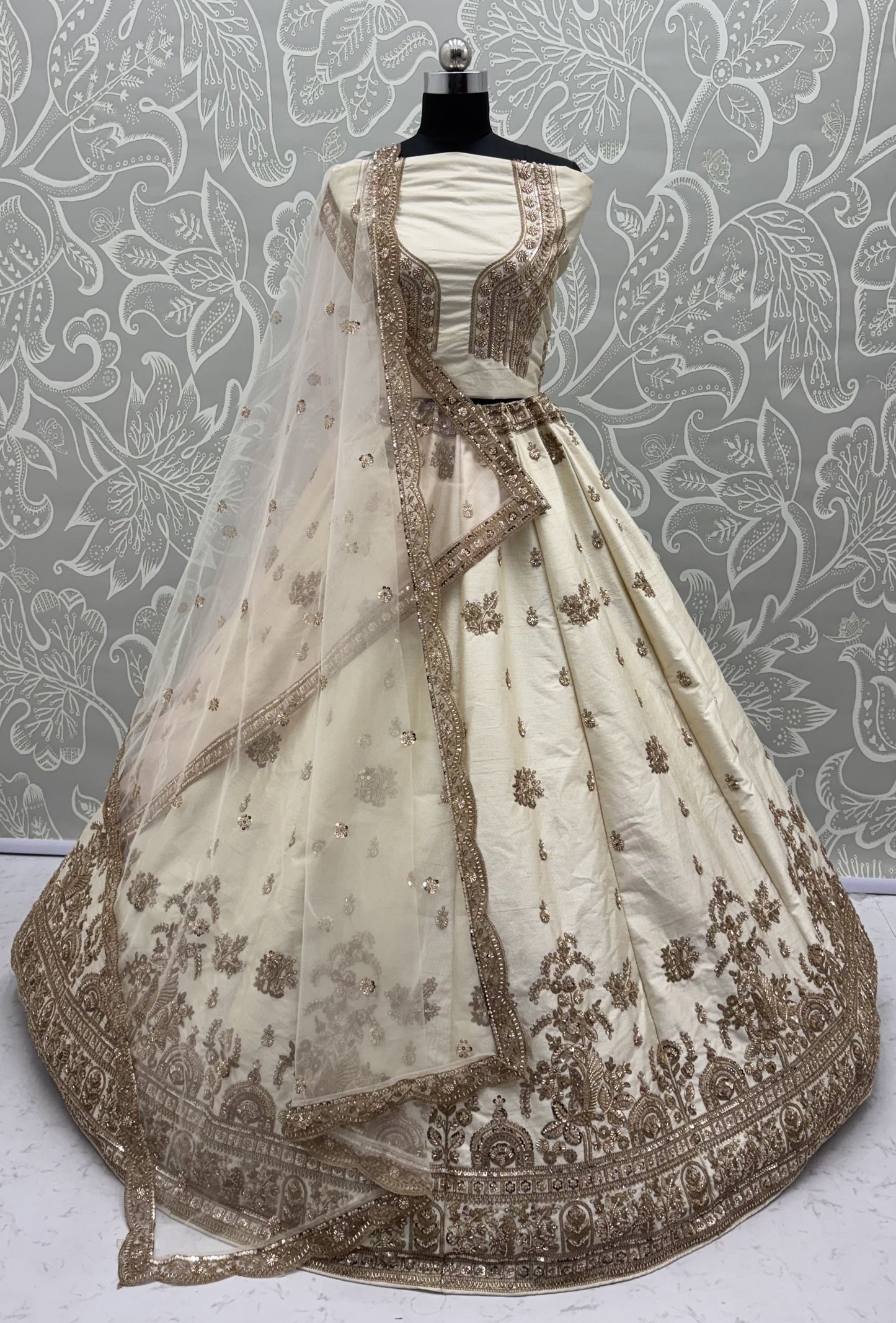 Ivory White Gadhwal Silk Bridal Lehenga Choli with Zari Embroidery, Bead Work & Designer Net Dupatta