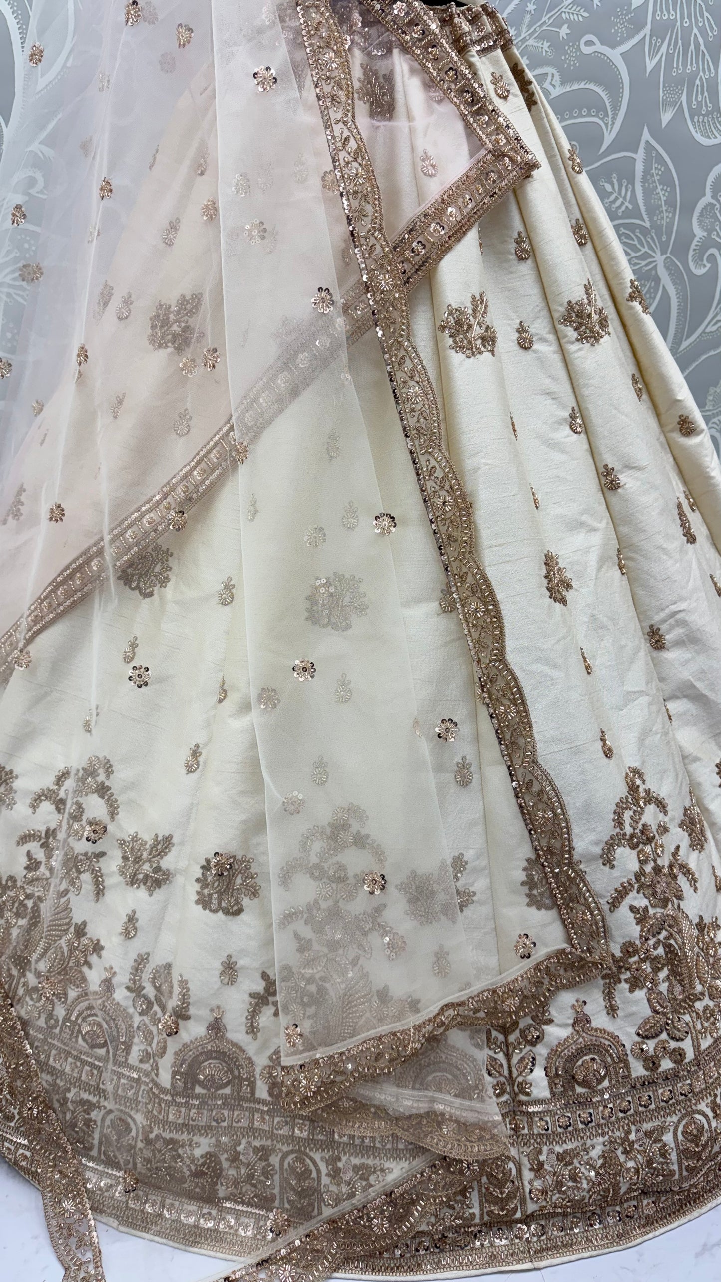Ivory White Gadhwal Silk Bridal Lehenga Choli with Zari Embroidery, Bead Work & Designer Net Dupatta