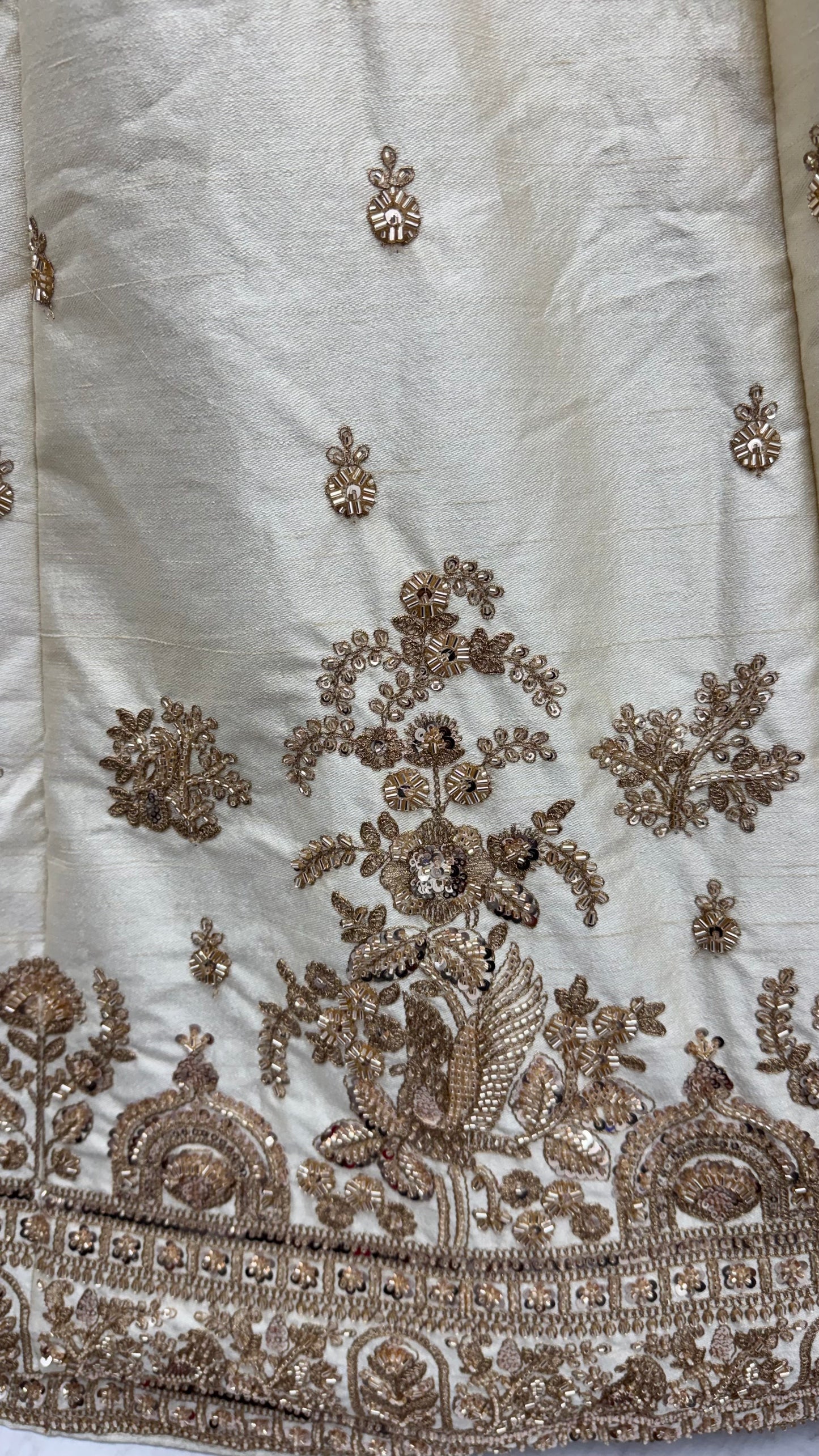 Ivory White Gadhwal Silk Bridal Lehenga Choli with Zari Embroidery, Bead Work & Designer Net Dupatta