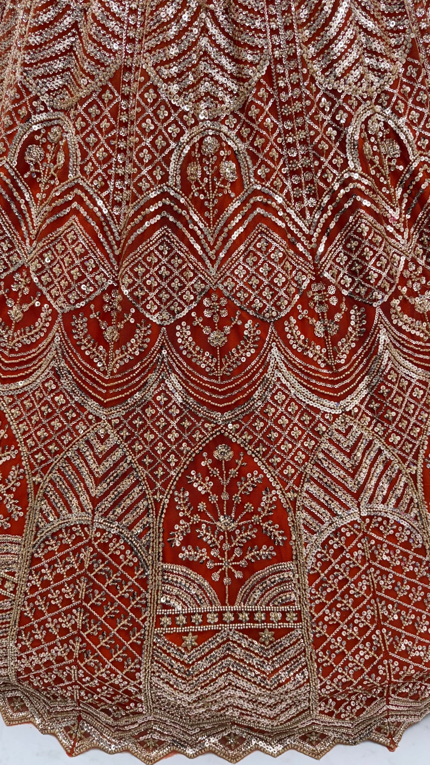 Rust Orange Net Party Wear Lehenga Choli with Crystal Motif & Sequins Work
