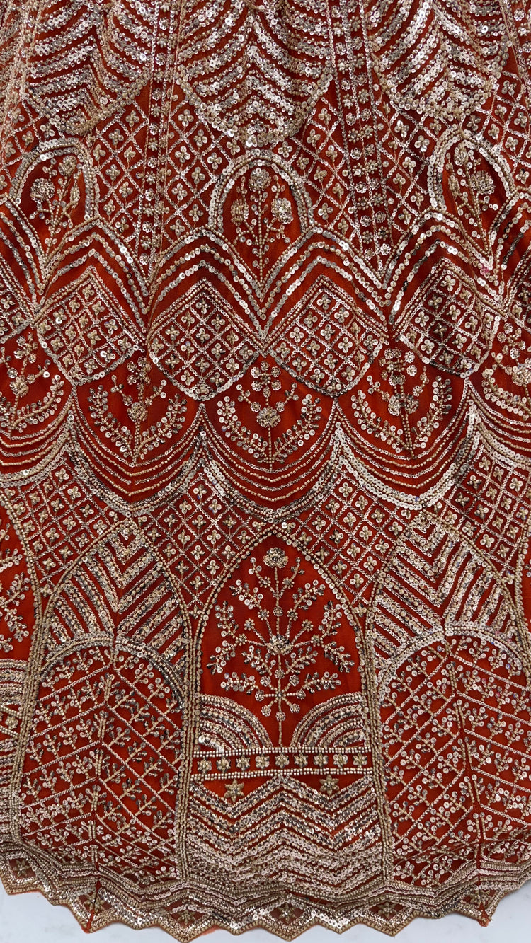 Rust Orange Net Party Wear Lehenga Choli with Crystal Motif & Sequins Work