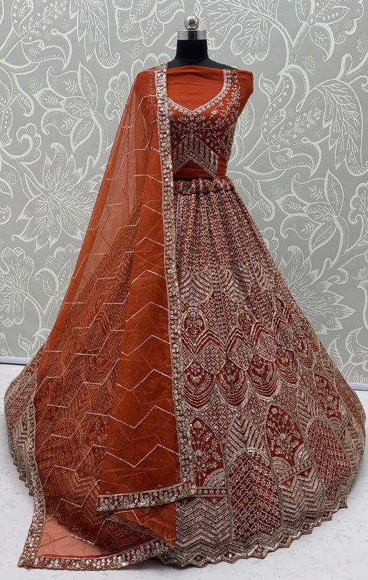 Rust Orange Net Party Wear Lehenga Choli with Crystal Motif & Sequins Work