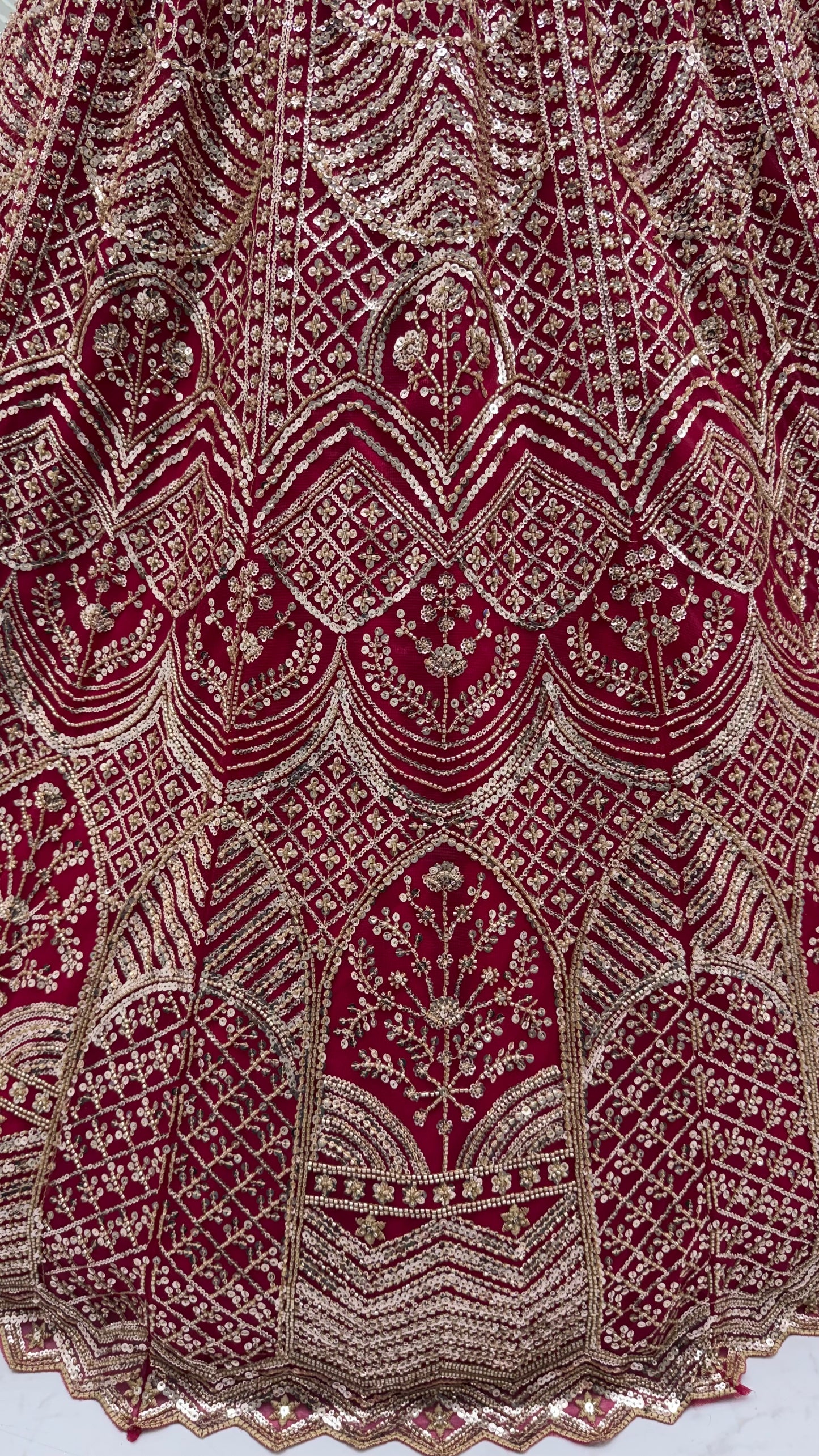 Wine Red Net Party Wear Lehenga Choli with Crystal Motif & Sequins Work
