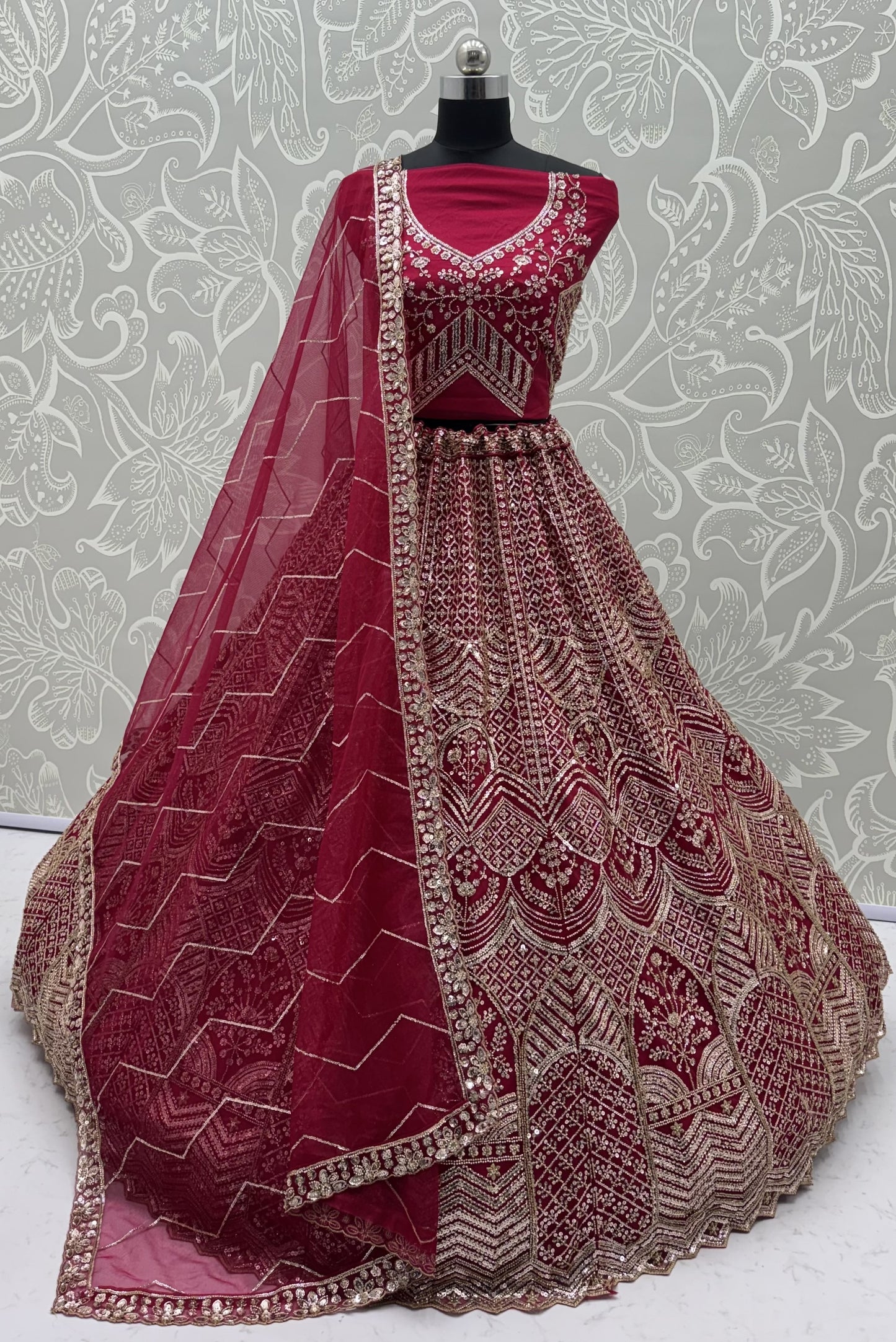 Wine Red Net Party Wear Lehenga Choli with Crystal Motif & Sequins Work