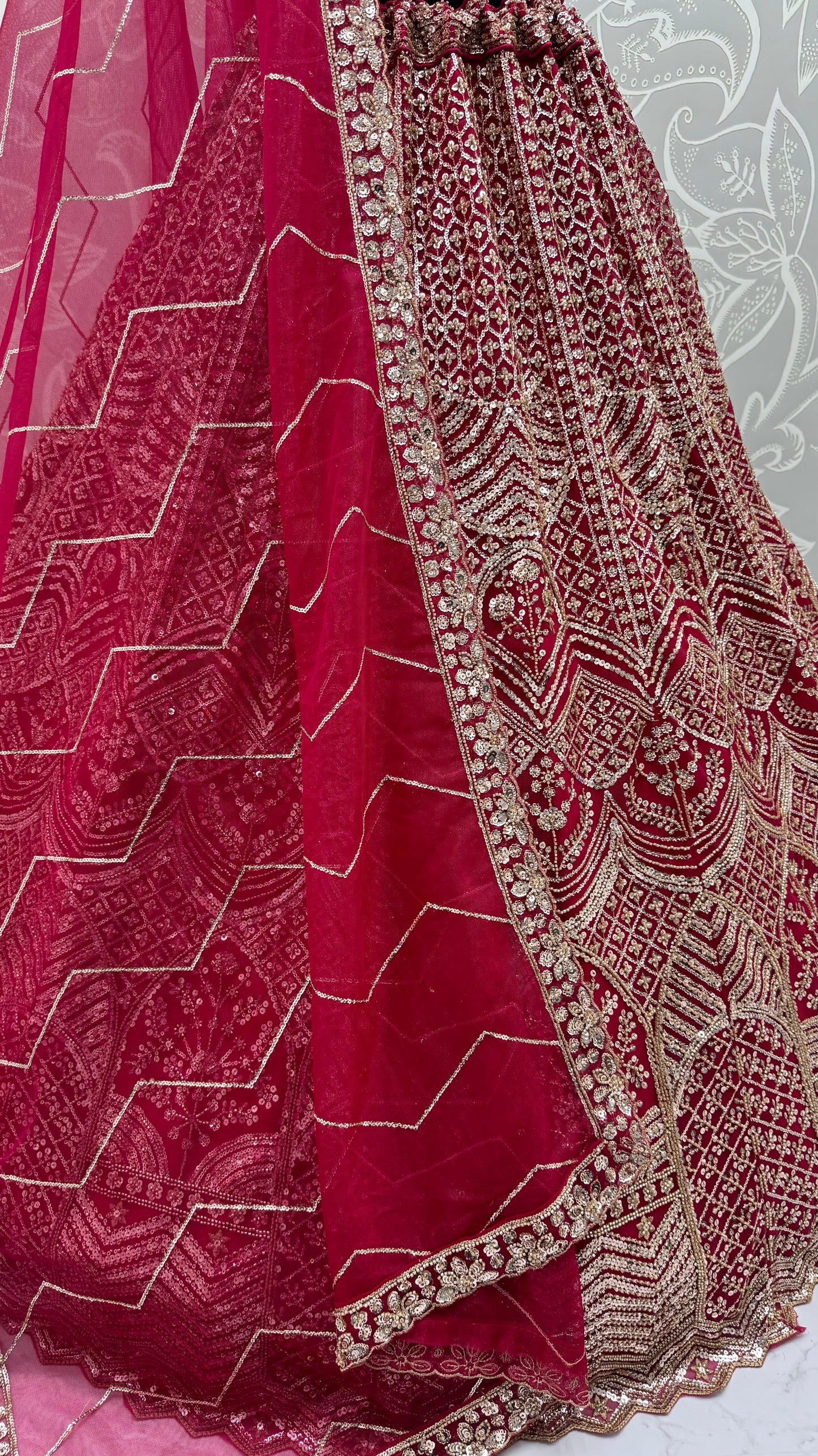 Wine Red Net Party Wear Lehenga Choli with Crystal Motif & Sequins Work