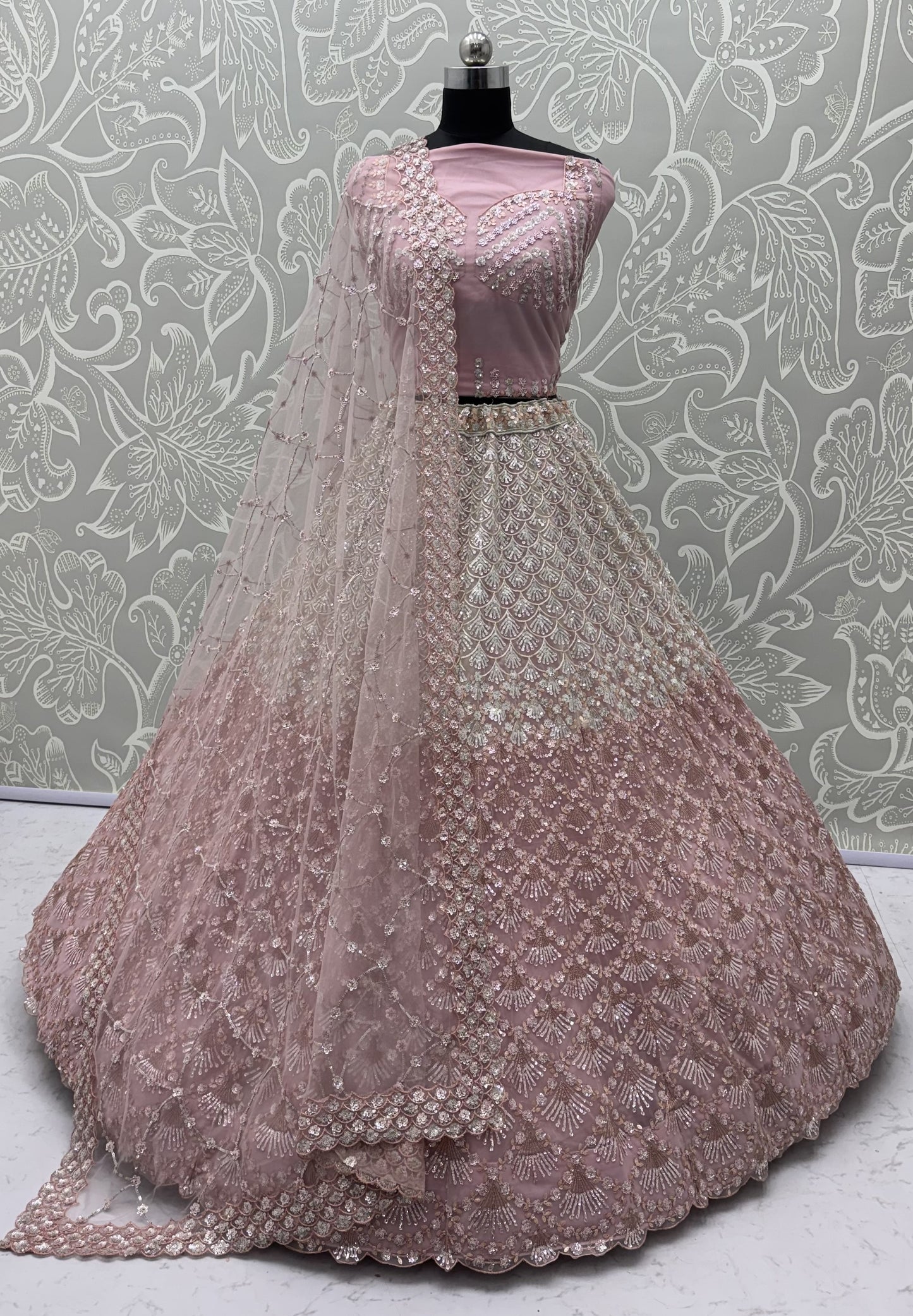 Blush Pink Heavy Net Embroidered Bridal Lehenga Choli with Sequins & Zari Work