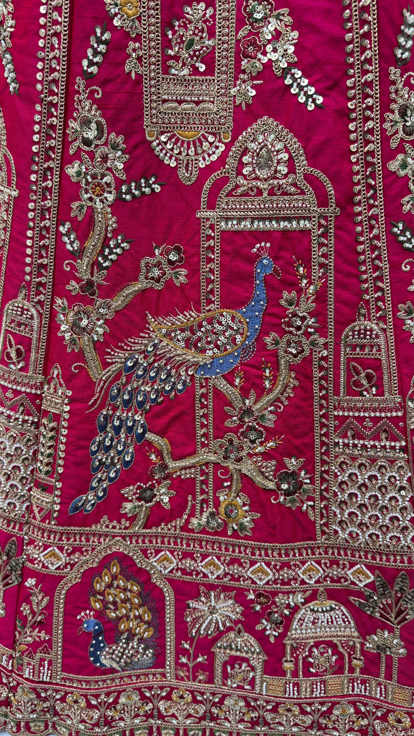 Rani Pink Gadhwal Silk Peacock Handwork Bridal Lehenga Choli with Dual Soft Net Dupatta