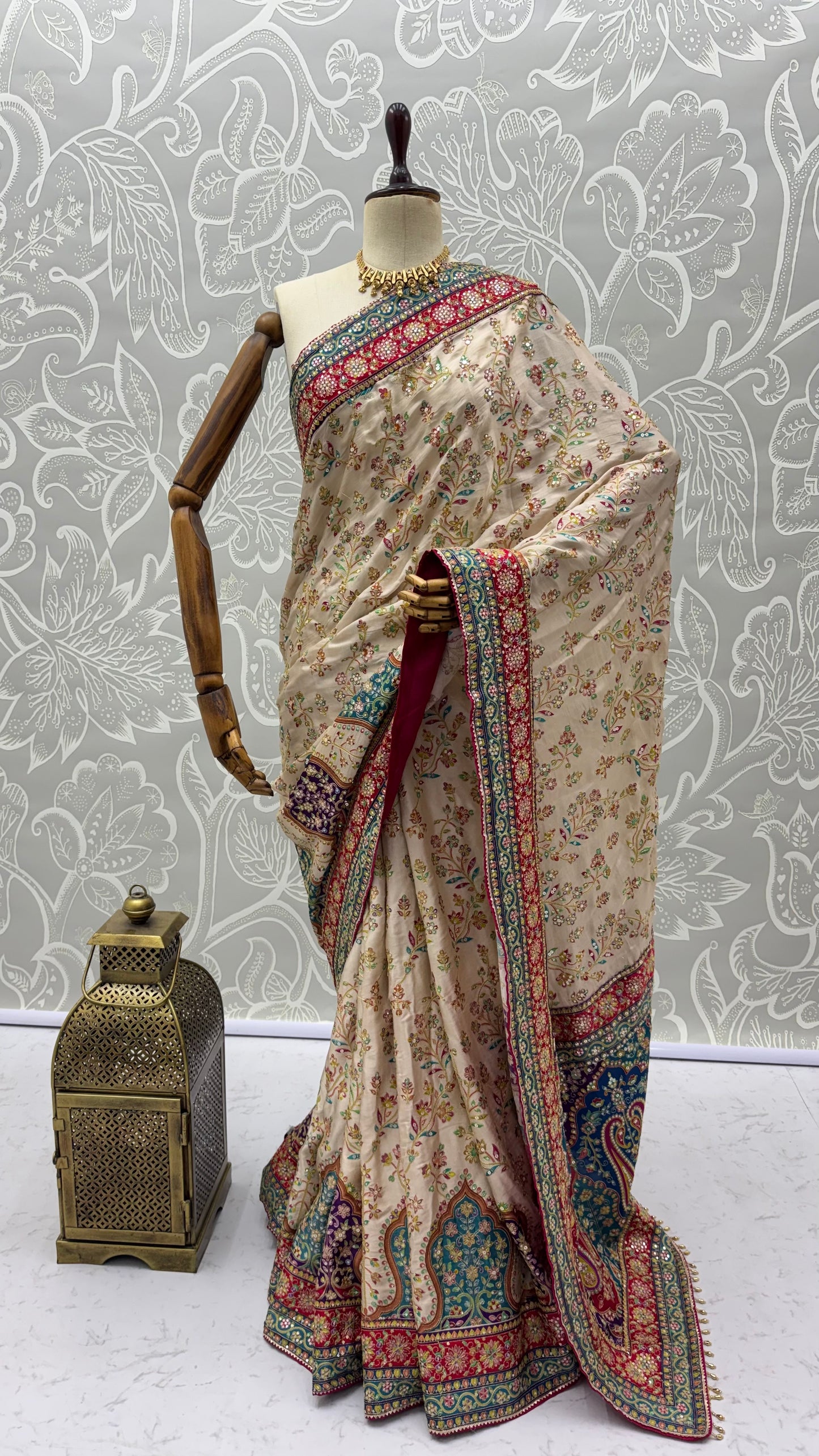 Elegant Ivory Detailing Work Saree with Traditional Embroidered Border