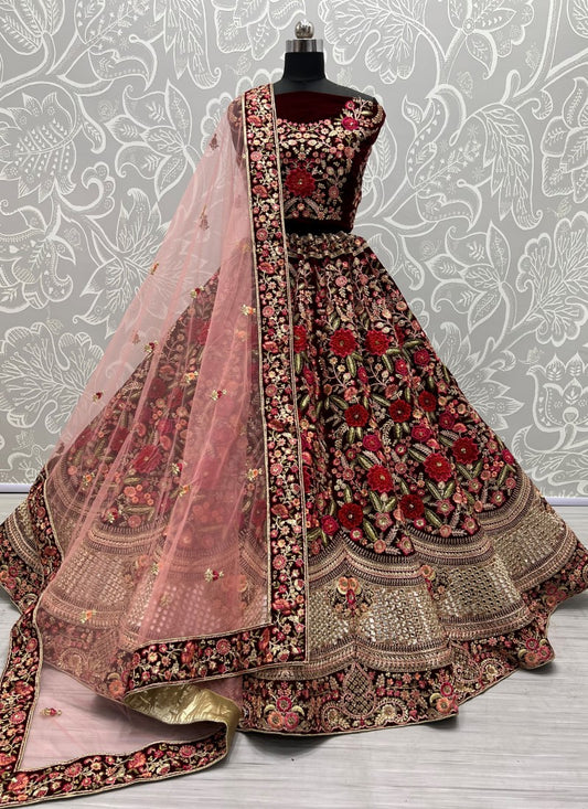 Admirable Art of Work in Maroon Bridal Lehenga - Patch work with handcrafted mirror and many more.