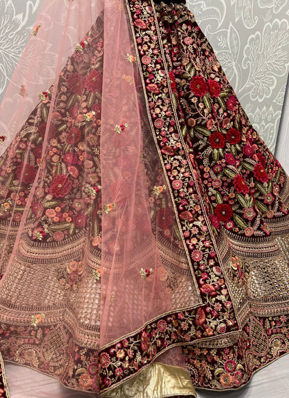 Admirable Art of Work in Maroon Bridal Lehenga - Patch work with handcrafted mirror and many more.