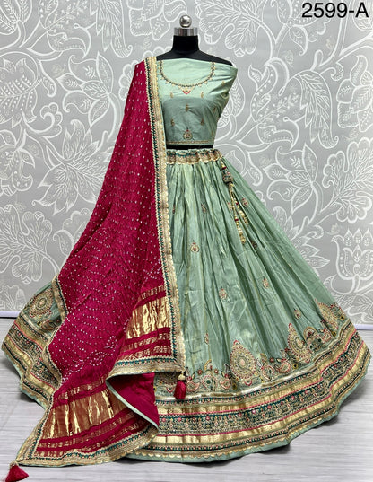 Pure Gajji silk Bandhani Dupatta and Gadhwal silk crafted Wedding Wear Lehengacholi