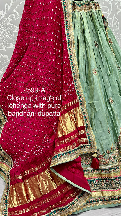 Pure Gajji silk Bandhani Dupatta and Gadhwal silk crafted Wedding Wear Lehengacholi