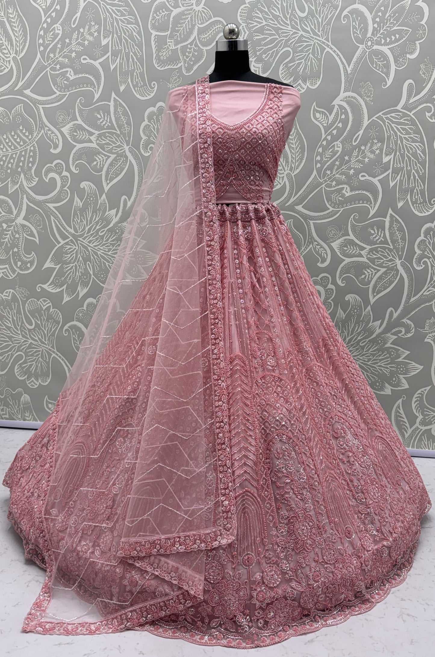 Blush Pink Net Party Wear Lehenga Choli with Crystal Motifs & Sequins Work
